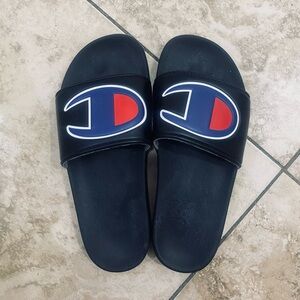 Champion Slides Sandals with Champion Logo in good condition